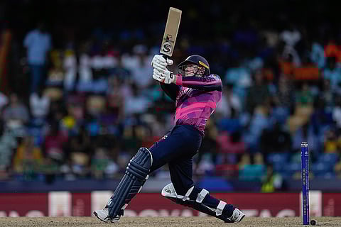 Michael Leask hits a six against Namibia